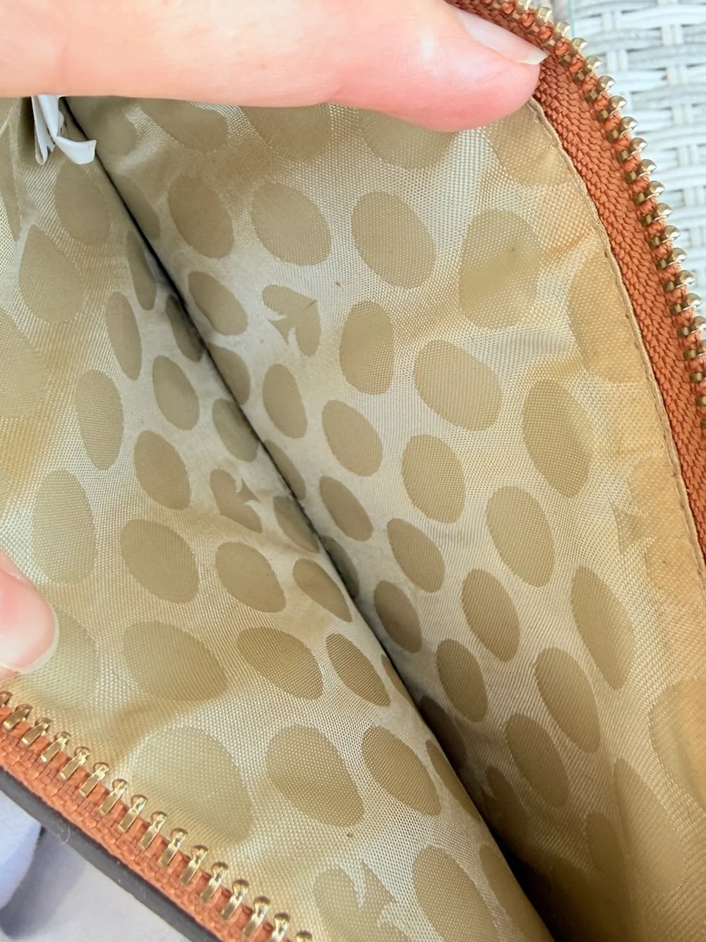 kate spade wristlet clutch in rust orange